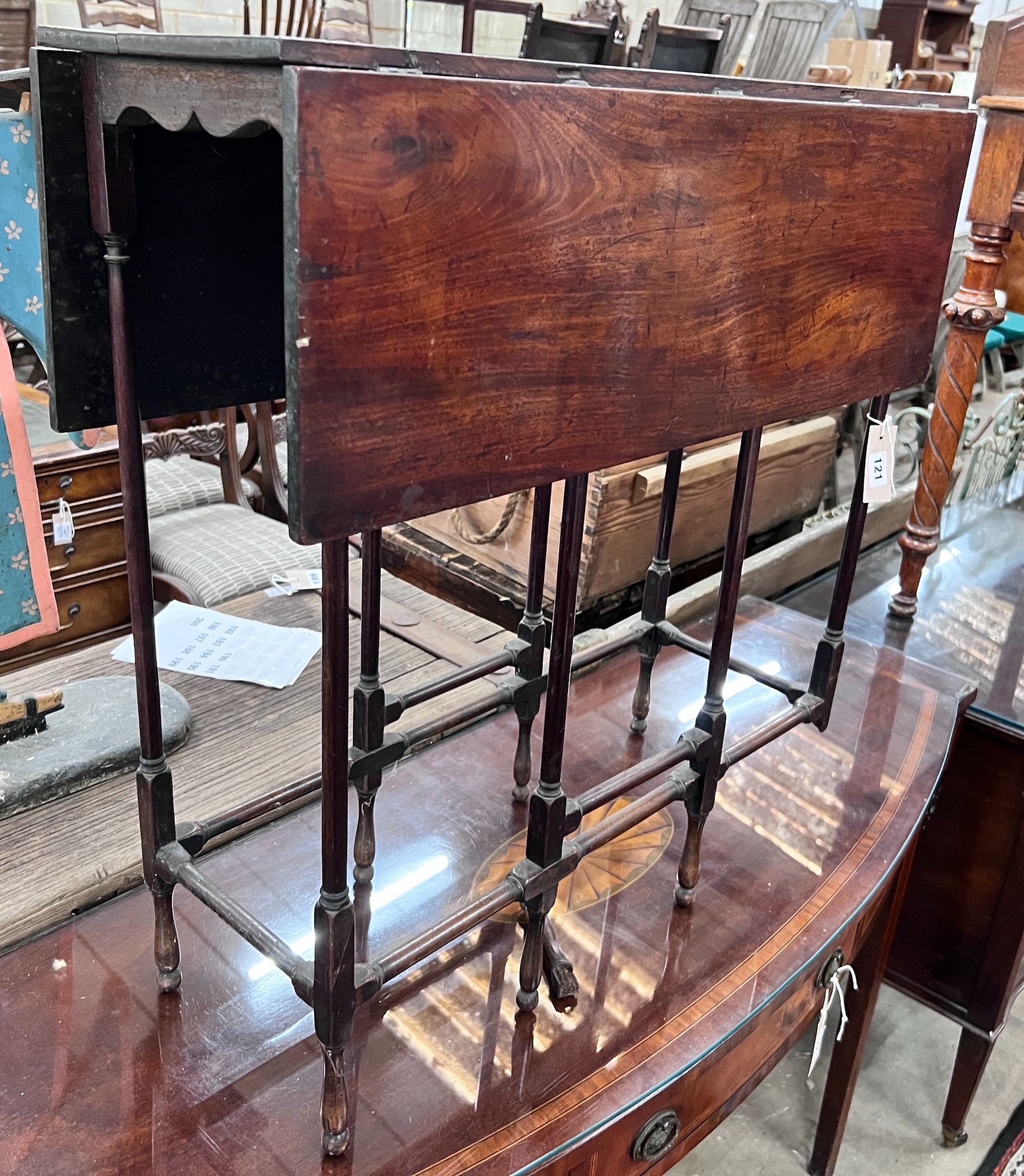 A mahogany spider leg table, width 71cm, depth 27cm, height 71cm *Please note the sale commences at 9am.